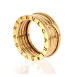 A LADIES 18CT GOLD BULGARI EXPANDING RING