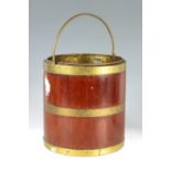 A GEORGE III MAHOGANY CYLINDRICAL BRASS BOUND OYSTER PAIL