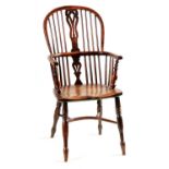 AN EARLY 19TH CENTURY NOTTINGHAMSHIRE YEW-WOOD HIGH BACK WINDSOR CHAIR