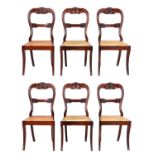 A SET OF SIX REGENCY SABRE LEG BERGERE DINING CHAIRS IN THE MANNER OF GILLOWS