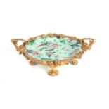 A LATE 19TH CENTURY ORMOLU MOUNTED FAMILLE ROSE CELADON DISH