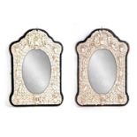 A FINE PAIR OF 19TH CENTURY DIEPPE, FRANCE CARVED BONE WORK OVAL HANGING MIRRORS