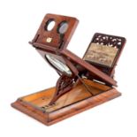 MARR & ROBERTSON OPTICIANS, LIVERPOOL. A VICTORIAN FIGURED WALNUT TABLE TOP STEREOSCOPIC VIEWER