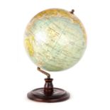 AN EARLY 20TH CENTURY 14" TERRESTRIAL GLOBE ON STAND