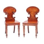 A PAIR OF 19TH CENTURY HALL CHAIRS IN THE MANNER OF GILLOWS