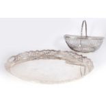 A LARGE OVAL SILVER PLATED TRAY TOGETHER WITH AN OLD SHEFFIELD PLATE BASKET