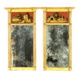 A PAIR OF 19TH CENTURY GILT MOULDED HANGING MIRRORS