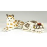 TWO CONTINENTAL PORCELAIN RECUMBENT CATS