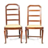 AN UNUSUAL PAIR OF EARLY 18TH CENTURY WALNUT SIDE CHAIRS
