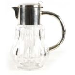 AN EDWARDIAN SILVER PLATED FACETED CUT GLASS LEMONADE JUG