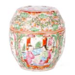 A CHINESE FAMILLE ROSE BARREL SHAPED JAR AND COVER