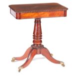 A WILLIAM IV FLAME MAHOGANY LAMP TABLE