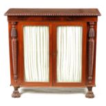 A REGENCY IRISH MAHOGANY AND ROSEWOOD CROSS-BANDED SIDE CABINET