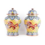 AN IMPRESSIVE PAIR OF EARLY 20TH CENTURY CHINESE CLOISONNE JARS AND COVERS