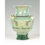 AN UNUSUAL 19TH CENTURY CHINESE GREEN AND YELLOW GROUND FOOTED VASE