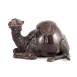 AN UNUSUAL 19TH CENTURY BRONZE AND COCONUT INKWELL FORMED AS CAMEL