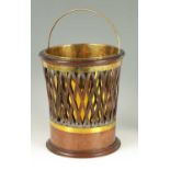 AN UNUSUAL GEORGE III MAHOGANY LATTICE WORK OYSTER PAIL