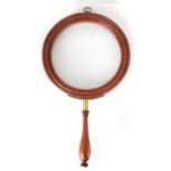 A LARGE 19TH CENTURY MAGNIFYING LIBRARY GLASS
