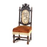 A VICTORIAN OAK SIDE CHAIR WITH ARMORIAL CREST HAVING HERALDIC DOGS