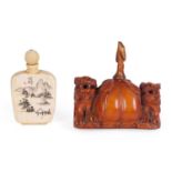 A 19TH CENTURY CHINESE STAINED IVORY TABLE SNUFF BOTTLE