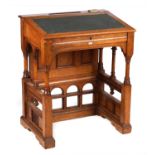 A LATE 19TH CENTURY HONEY COLOURED OAK ATHESTHETIC PERIOD WRITING DESK