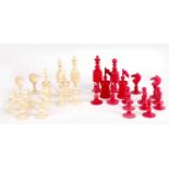 A 19TH CENTURY STAINED BONE CHESS SET