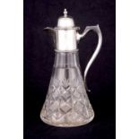 A LATE 20TH CENTURY CUT GLASS SILVER CLARET JUG