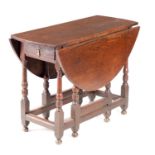 AN 18TH CENTURY OAK GATE LEG TABLE OF SMALL SIZE