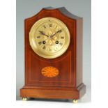 AN EARLY 20TH CENTURY FRENCH MAHOGANY INLAID MANTEL CLOCK