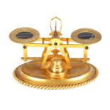 A SET OF 19TH CENTURY ORMOLU AND AGATE LETTER SCALES