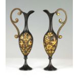 A PAIR OF LATE 19TH CENTURY ALHAMBRA STYLE MINIATURE GOLD INLAID EWERS