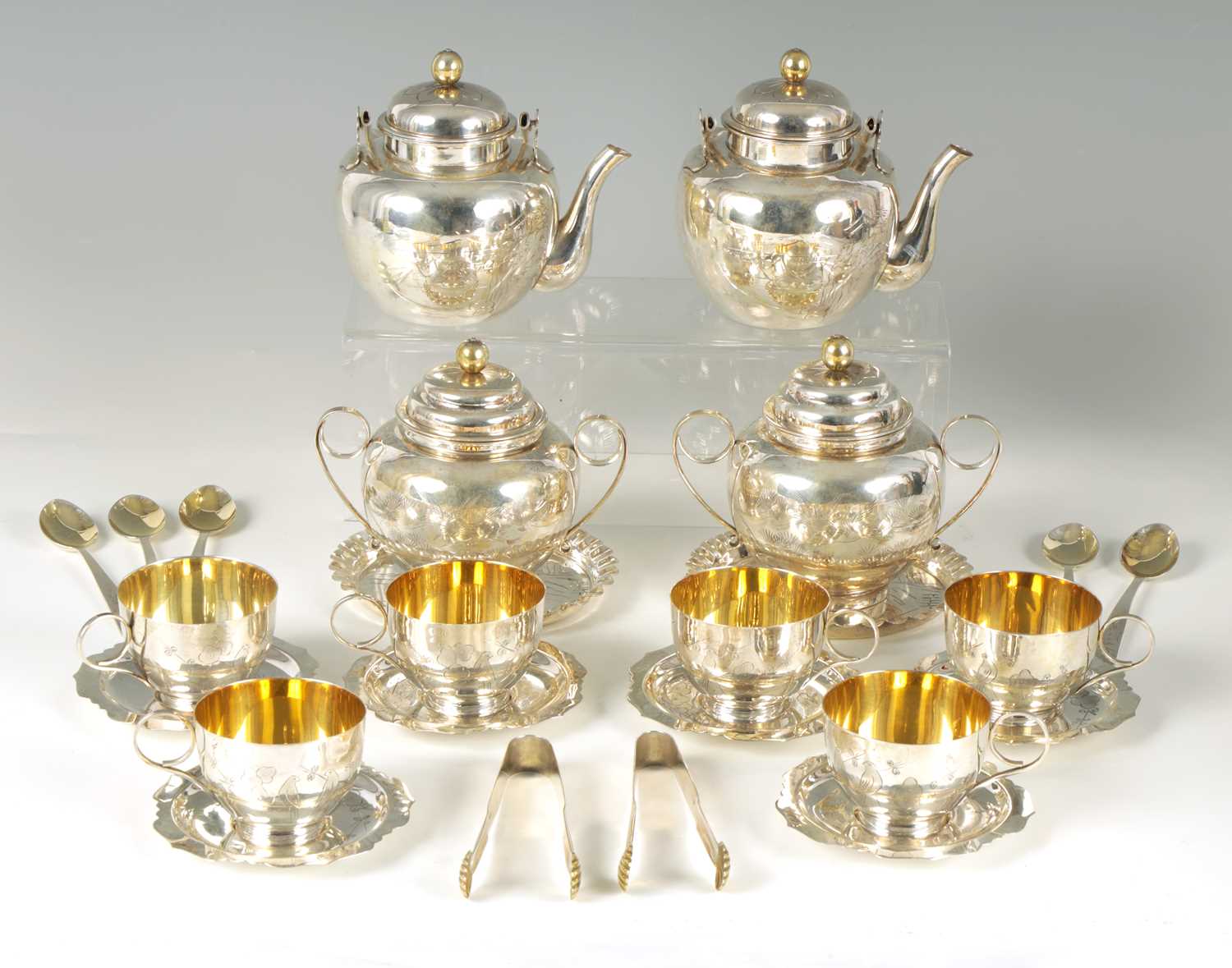 A CONTINENTAL JAPANESE STYLE SILVER AND GILT TEA SERVICE