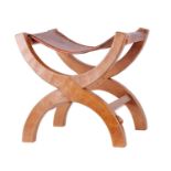 ROBERT 'MOUSEMAN' THOMPSON AN OAK AZED ‘X’ FRAMED STOOL