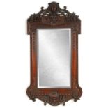 A GOOD QUALITY LATE 19TH CENTURY MAHOGANY HANGING MIRROR IN THE MANNER OF WILLIAM KENT PROBABLY BY W
