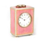 CARTIER. AN EARLY 20TH CENTURY MINIATURE SWISS SILVER ENAMELLED BOUDOIR CARRIAGE CLOCK