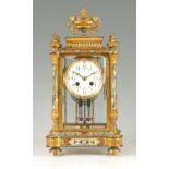 A LATE 19TH CENTURY FRENCH ORMOLU AND CHAMPLEVE ENAMEL FOUR-GLASS MANTEL CLOCK