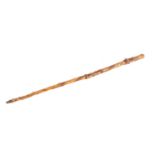 A 19TH CENTURY FOLK ART HAWTHORN WALKING STICK