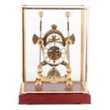 A 20TH CENTURY BRASS 'HARRISONS SEA CLOCK' STYLE SKELETON CLOCK