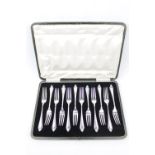 Cased Set of 12 Silver Forks with shell motif handles by Cooper Brothers & Sons, Sheffield 1926.