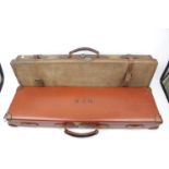 P Brady Leather Shotgun Case and a Fabric and Leather bound Gun Case
