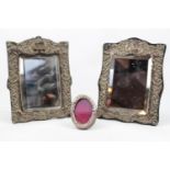 2 Edwardian Silver Foliate embossed table mirrors , (the small picture frame is not in this lot)