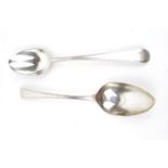 A pair of Silver George III tablespoons single struck with beaded edge, London 1780 by script George