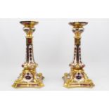 Pair of Royal Crown Derby 1128 pattern Castleton candlestick XXXIX, Out swept square base with