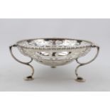 Ornate Edwardian Silver pierced centrepiece supported on tripod base and pad feet Sheffield 1912