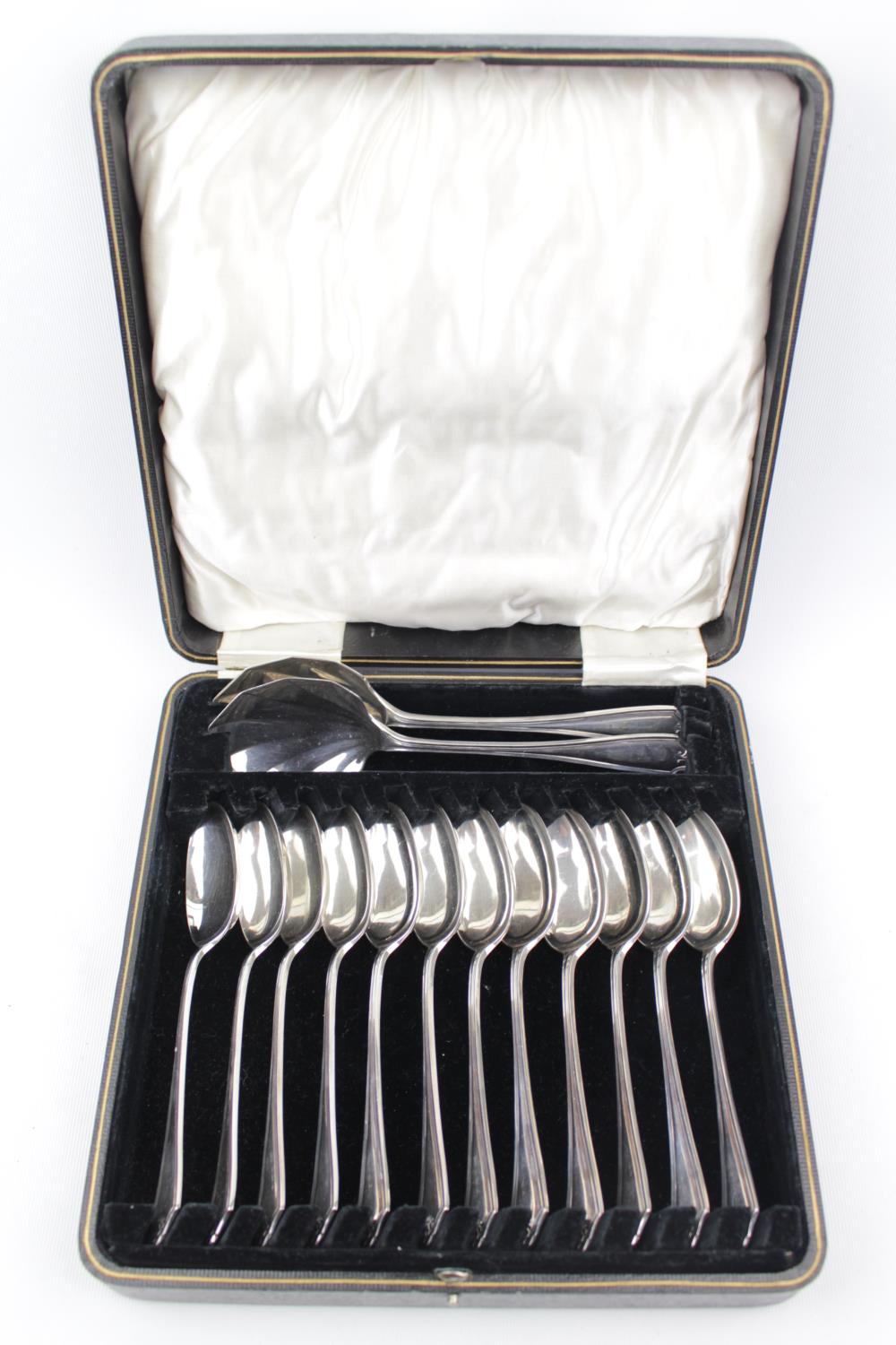 Heavy quality Cased set of 12 Silver Spoons and Serving spoons by Cooper Brothers & Sons Ltd,