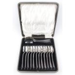 Heavy quality Cased set of 12 Silver Spoons and Serving spoons by Cooper Brothers & Sons Ltd,