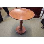 Late 19thC Mahogany Circular table with turned support and base with pad feet. 44cm in Diameter