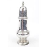 A Silver Georgian style caster with baluster finial 14cm high, London 1935. 111g total weight