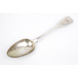 A William Elliott of London, circa 1822, fiddle pattern table spoon with engraving to the top.