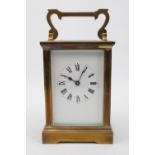 Good Quality 20thC Brass Cased carriage clock with roman numeral dial with double ended key 15cm